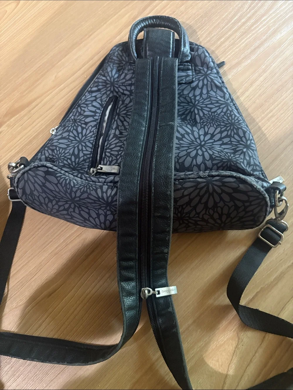 Baggallini Black and Gray Floral Sling Backpack